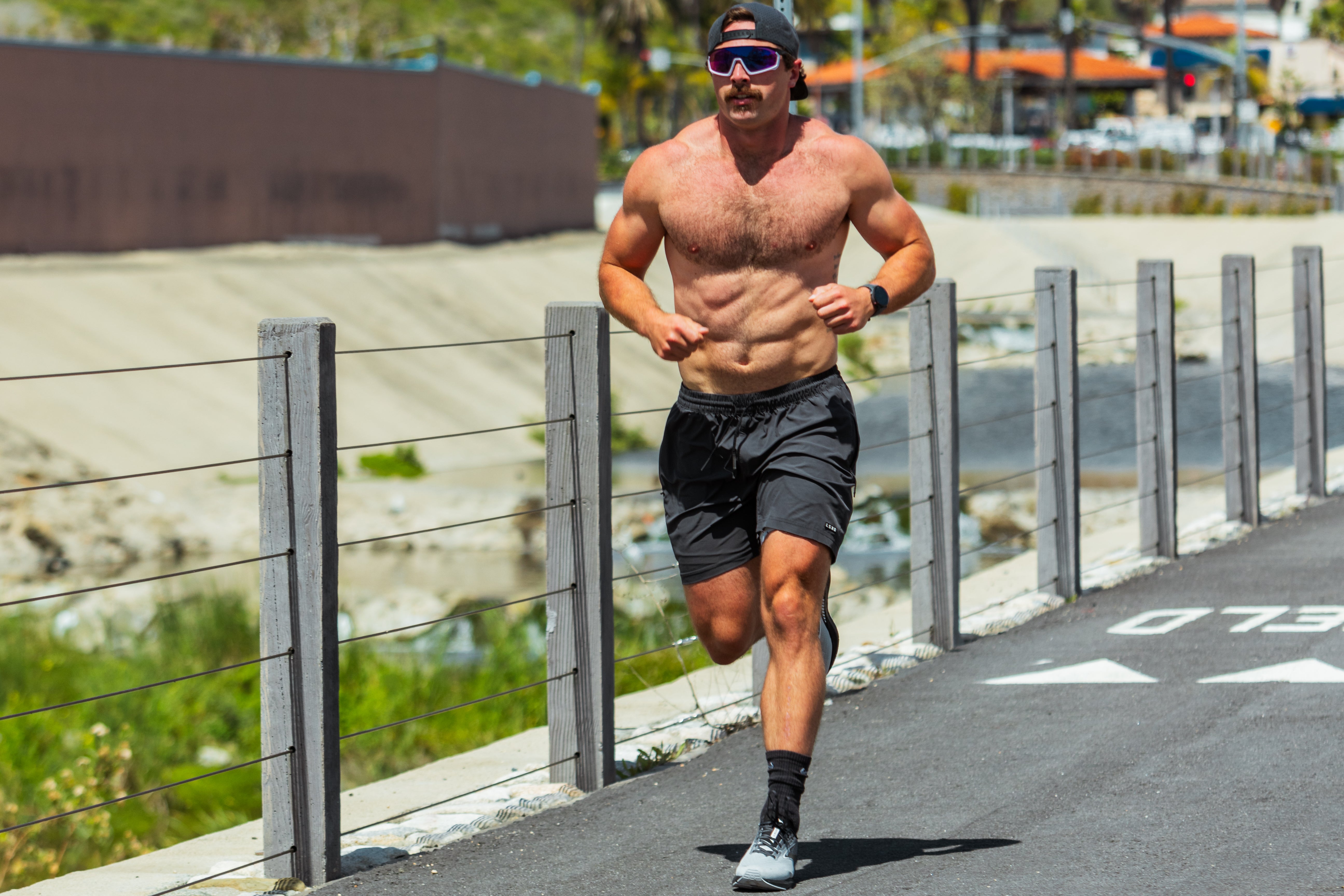 Athlete Nick OSullivan performing running intervals on the Hybrid Fit Program.